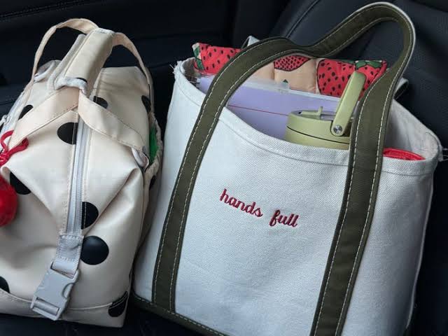 Women in the workplace are putting a new twist on L.L.Bean's famous tote bags