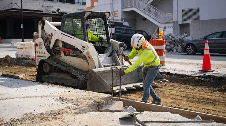 US economy added 115,000 jobs in April, beating expectations
