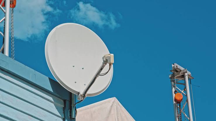 Giant troubled satellite TV company files Chapter 11 bankruptcy