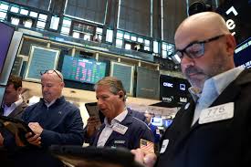 Stocks slide on flare-up in Middle East fighting; oil eases off highs