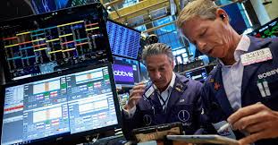 Nasdaq and S&P 500 slip while Dow hits record close