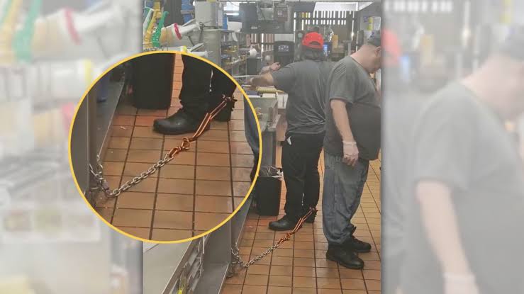 Investigating alleged image of chained McDonald's worker preparing food