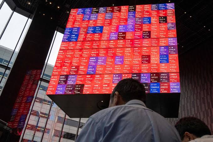 Nikkei Stock Average tops 65,000 for first time