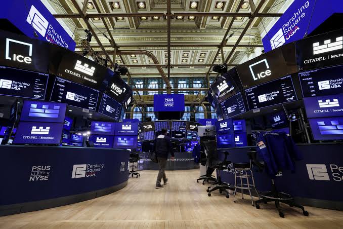 Wall St ends lower for the day and week as chip selloff broadens