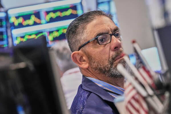 World shares are mixed after Dow hits a new record, as some AI shares bounce back
