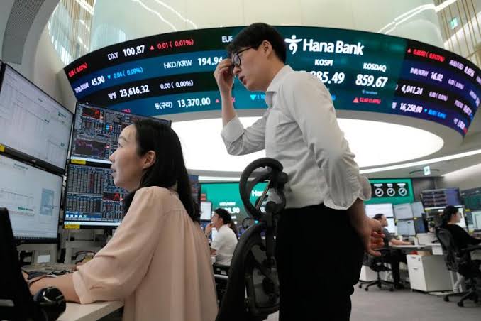 Asian markets retreat after rebounding AI stocks send the S&P 500 to brink of a new record