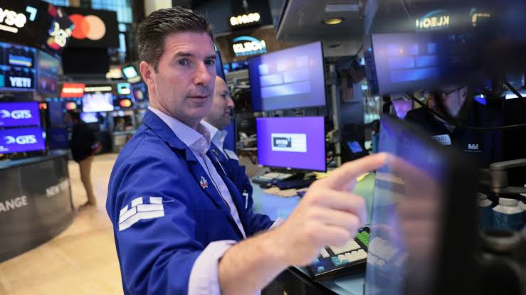 Stocks close at record highs with tech leading the way again. Nasdaq gains 8% in May