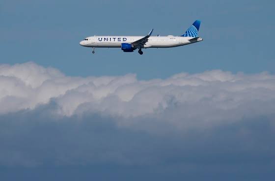 United flight rerouted after passenger tries to open door at 36,000 feet