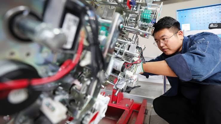 China industrial profits stay resilient as economy leans on factories, exports
