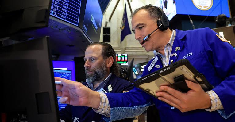 Wall Street ends choppy session lower as tech shares drop