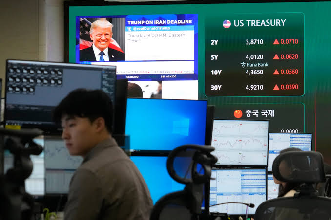 Asian shares mostly gain while European trading stays closed for a holiday