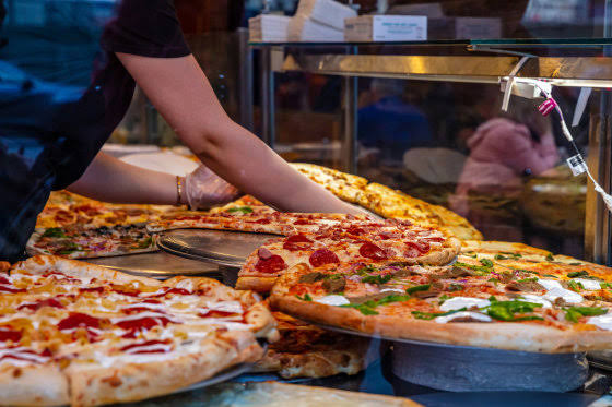 A proposed additive ban could change New York’s pizza and bagels, some say for the better