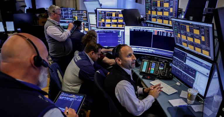 Wall Street rallies, Dow closes at record on Iran talks optimism