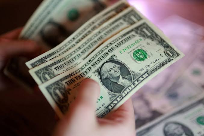 Dollar edges higher on escalating US-Iran tension, yen slides on pension doubts