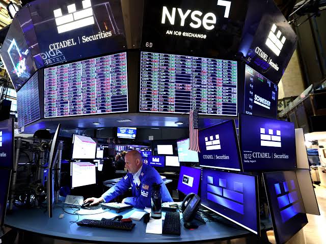 Stock market hits records as Fed removes key safety net