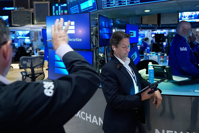 US stocks rise after data shows slowing inflation, even as IBM plunges