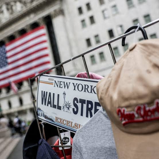 Wall St falls as tech earnings spark AI spending worries and oil hits $100
