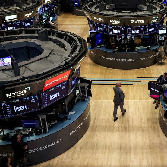 Wall St ends higher on cool inflation data, strong earnings