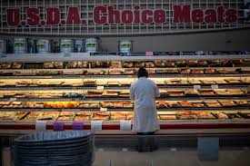 US consumer confidence unexpectedly improves, but higher gasoline prices still a worry