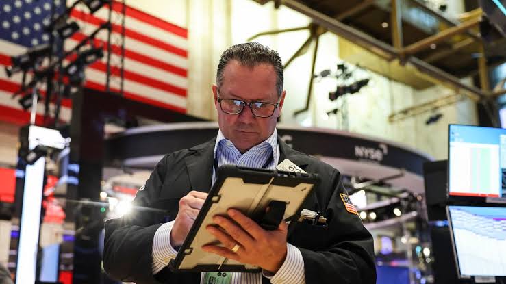 S&P 500 ekes out a gain for first close above 7,400 despite another Iran setback: Live updates