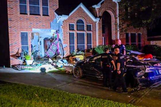 Tesla driver charged with manslaughter over crash into Texas home
