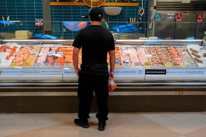 Inflation cooled off in June as energy prices slid