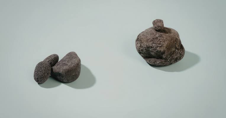 Earth is quietly dusted with thousands of tonnes of space material every year, most of it as grains smaller than sand — and some of it can be sifted from the grit of ordinary roof gutters, tiny meteorites hiding in plain sight in cities.