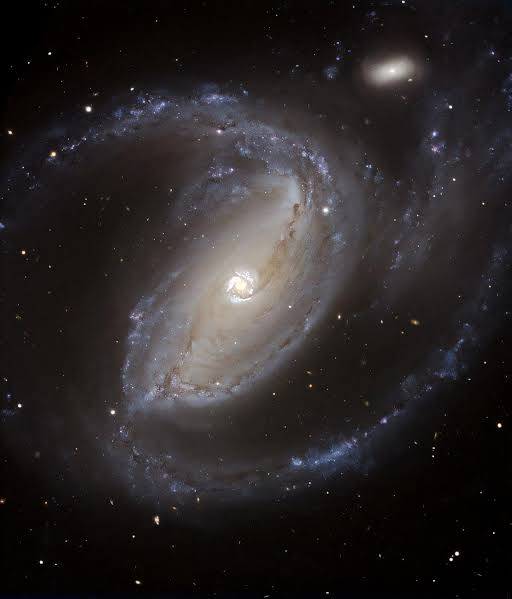 Astronomers uncover the earliest known signs of galaxy-building in action