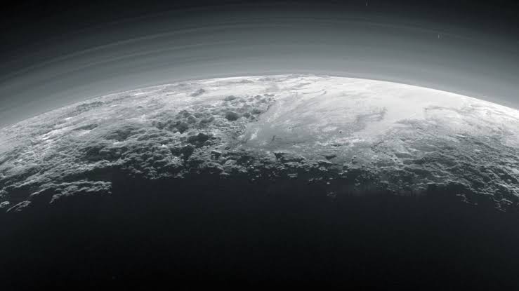 Pluto's atmosphere is collapsing as it drifts away from the sun into a deep freeze