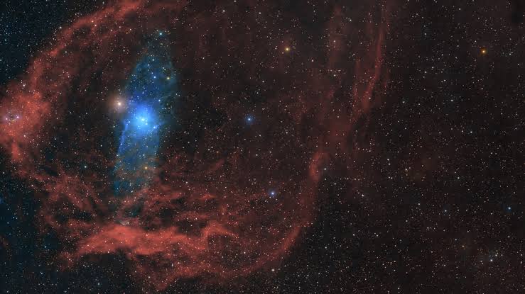 Mysterious 'little red dots' at the beginning time may finally have an explanation, thanks to newfound 'little blue companions'