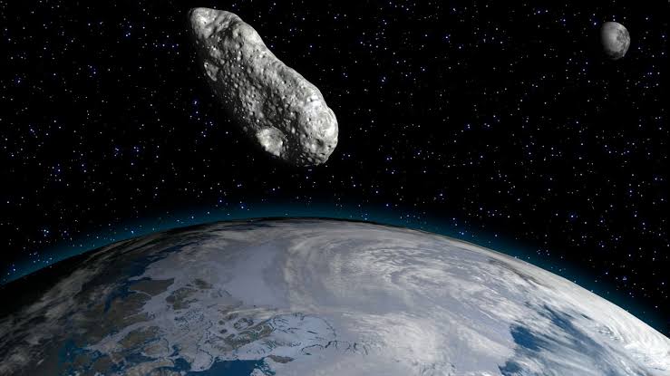 Scientists say a newly discovered, blue-whale-size asteroid will fly super close to Earth on Monday