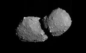 Japan’s asteroid sample retriever rapidly buzzes remote space rock