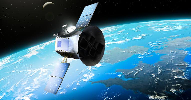 A NASA satellite launched in 1976 carries a Carl Sagan–designed plaque sealed inside its core, mapping Earth's continents 268 million years ago, at launch, and 8.4 million years from now — and that last date is no accident, because it's roughly when the sat