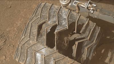 NASA's Curiosity Rover Appears To Be In A Spot Of Trouble, And May Need A Sharp Rock To Deal With It