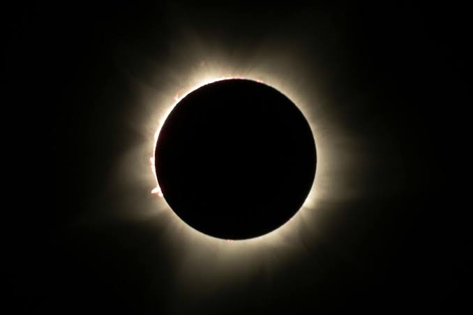 The Parker Solar Probe is now moving at 430,000 miles per hour, fast enough to cross the continental United States in 20 seconds, and it survives skimming the Sun's corona because a four-and-a-half-inch slab of carbon foam stays at room temperature on the