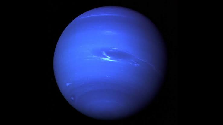 How does a planet 4.5 billion kilometres from the Sun, where daylight is roughly 900 times dimmer than on Earth, whip up the fastest winds in the entire solar system?