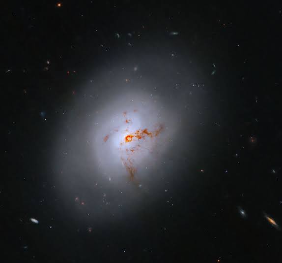 Hubble reveals rare galaxy 100 million light-years away caught in transition
