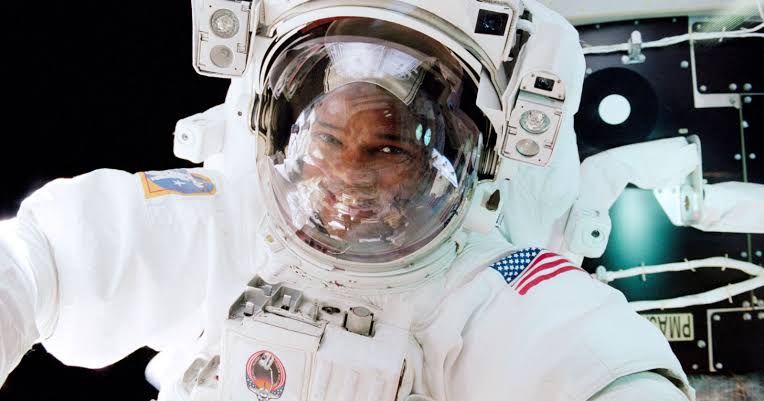 Within hours of reaching microgravity, astronauts’ body fluids shift toward the head, dulling smell and taste — one reason NASA monitors daily nutrition so closely as crews fight the muscle loss space exercise alone cannot fully prevent