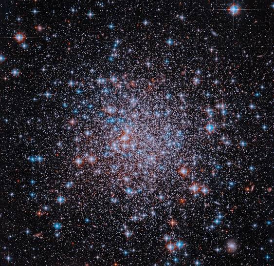 NASA Celebrates July 4th With a Stunning Hubble Cosmic Sparkler From the Dawn of Time