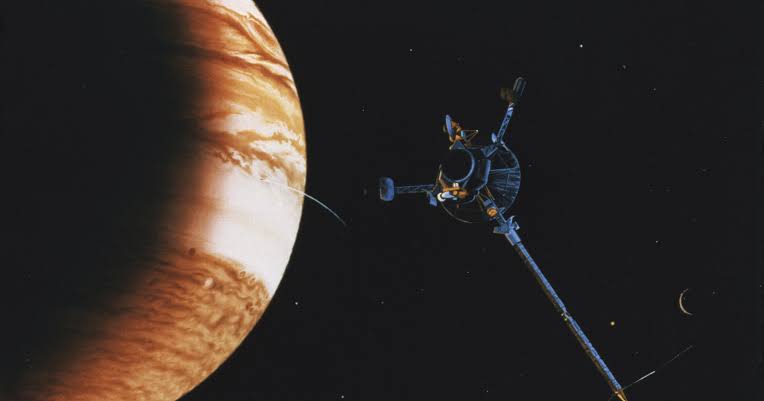 When the Galileo spacecraft's main antenna failed to unfurl on the way to Jupiter, engineers salvaged the mission by rewriting its software across deep space, compressing its data and squeezing a flagship science return through a low-gain antenna never me