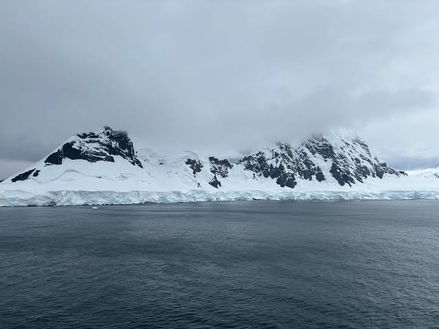 Antarctica is classified as a desert because it receives less precipitation than the Sahara, yet it holds about 70 per cent of the planet's fresh water, locked in an ice sheet averaging over two kilometres thick across the continent