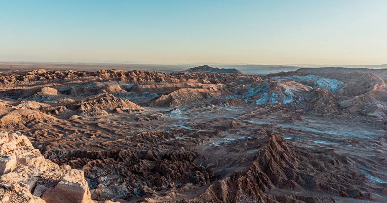 In the driest desert on Earth lies a landscape so hostile it resembles Mars — ancient salt flats, near-lifeless soils, towering volcanoes, and some of the clearest skies on the planet, where scientists search for clues about life beyond Earth.