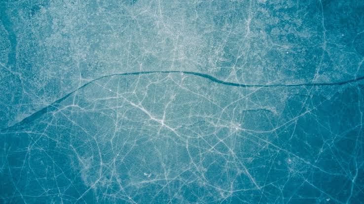 We tend to imagine the habitable zone as a narrow ring around a star, but icy moons have transformed that picture. Far beyond the reach of life-sustaining sunlight, vast oceans may remain liquid beneath their frozen surfaces—warmed by the constant gravitati