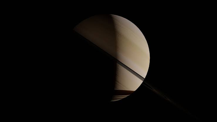 No spacecraft has ever landed in the outer solar system — except one: the Huygens probe, which parachuted through Titan's orange haze in 2005 and touched down more than a billion kilometres from Earth in cold that dropped below minus 170 degrees Cels