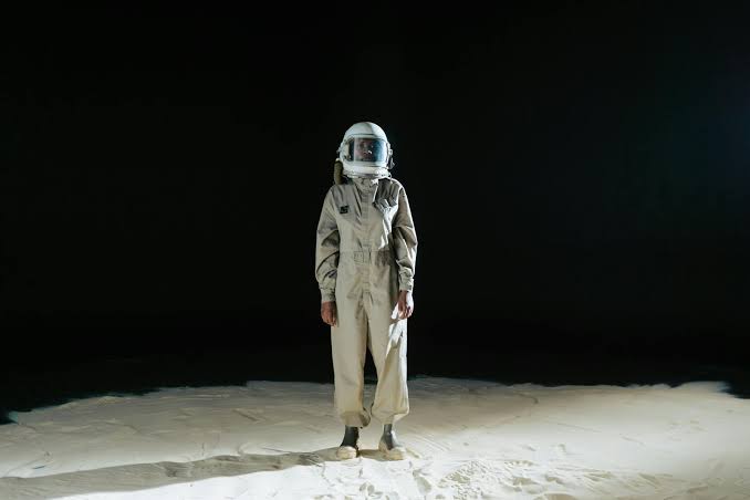 In 1965, Soviet cosmonaut Alexei Leonov stepped outside Voskhod 2 for the first spacewalk in history, and his suit ballooned so badly in vacuum that he had to bleed oxygen through a valve to fit back inside before orbital darkness