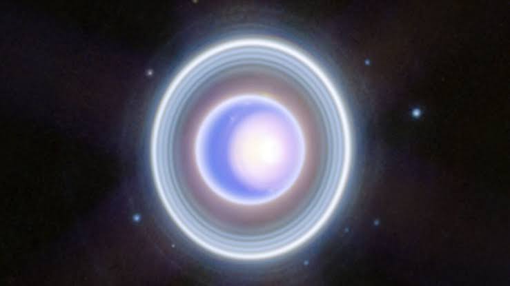 Mysterious rings around Uranus point to hidden moons orbiting the ice giant
