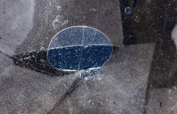 At least six moons in our solar system are thought to hide oceans of liquid water beneath their frozen surfaces — and the list may keep growing as old spacecraft data, improved models and new missions reveal oceans in increasingly unexpected places