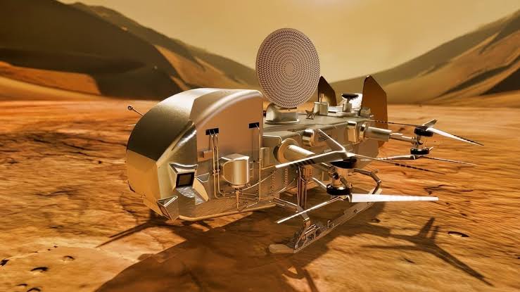 In July 2028 NASA launches a car-sized, 1,000-pound nuclear drone toward Saturn's moon Titan, a six-year, $3.35 billion trip to a world where the air is four times denser than Earth's, gravity is one-seventh as strong, and flying is the easy part.