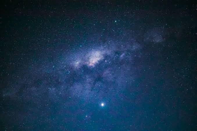 A single teaspoon of neutron star material would weigh about four billion tonnes on Earth — roughly the mass of a mountain — because the star has crushed the equivalent of the Sun into a sphere the width of a city
