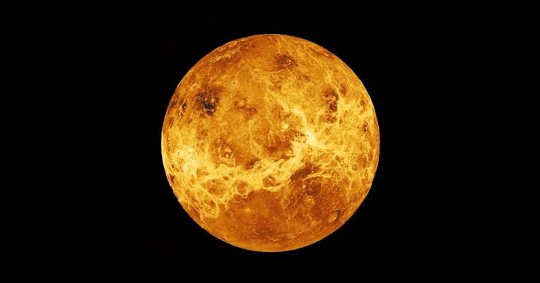 In 1982 the Soviet Union landed a probe on the surface of Venus that survived 127 minutes in heat that melts lead and pressure dense enough to crush a submarine — long enough to scan back two panoramas of flat basaltic rock under an orange-tinted sky b